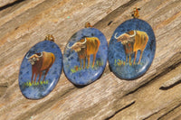 Polished Dumortierite Pendants with Hand Painted Buffalo - sold per item - From Mozambique