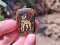 Polished Polychrome Jasper Pendant with Hand Painted Kudu - sold per item - From Madagascar