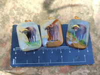 Polished Polychrome Jasper Pendant with Hand Painted Buffalo - sold per item - From Madagascar