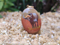 Polished Polychrome Jasper Pendant with Hand Painted Buffalo - sold per item - From Madagascar