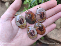 Polished Polychrome Jasper Pendant with Hand Painted Buffalo - sold per item - From Madagascar