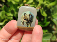 Polished Polychrome Jasper Pendant with Hand Painted Rhino - sold per item - From Madagascar