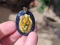 Polished Dumortierite Pendants with Hand Painted Lion - sold per item - From Mozambique