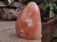 Polished Orange Twist Calcite Standing Free Form x 1 From Maevantanana, Madagascar