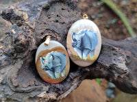 Polished Polychrome Jasper Pendant with Hand Painted Rhino - sold per item - From Madagascar