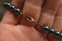 Polished Hematite & Gold Beaded Necklace - Sold Per Item - From Southern Africa