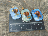 Polished Dumortierite Pendants with Hand Painted Buffalo - sold per item - From Mozambique