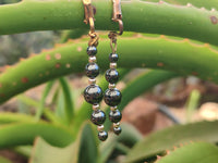 Polished Pair of Silver Hematite and Ball Shaped Bead Earrings - Sold per Pair - From China