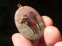 Polished Polychrome Jasper Pendant with Hand Painted Buffaloes - sold per item - From Madagascar