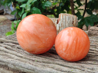 Polished Orange Twist Calcite Spheres x 2 From Madagascar