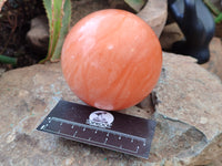 Polished Orange Twist Calcite Spheres x 2 From Madagascar