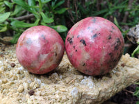 Polished Rhodonite Spheres x 2 From Zimbabwe