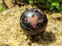 Polished Rhodonite Spheres x 6 From Ambindavato, Madagascar