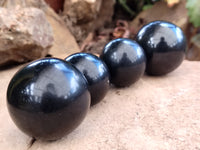 Polished Black Basalt Spheres x 12 From Madagascar