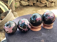 Polished Rhodonite Spheres x 6 From Ambindavato, Madagascar