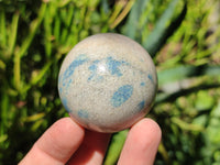 Polished Blue Spinel Spotted Quartz Spheres x 4 From Madagascar