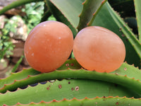 Polished Orange Twist Calcite Palm Stones x 12 From Madagascar