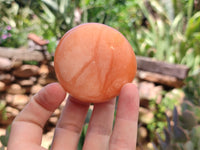 Polished Orange Twist Calcite Palm Stones x 12 From Madagascar