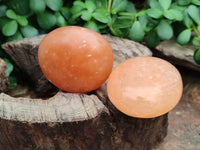 Polished Orange Twist Calcite Palm Stones x 12 From Madagascar