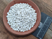 Polished Howlite Chips - sold per kg - From Zimbabwe