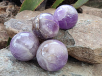 Polished Chevron Amethyst Sphears x 4 from Ankazobe, Madagascar