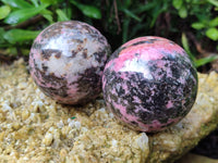 Polished Rhodonite Spheres x 4 From Ambindavato, Madagascar