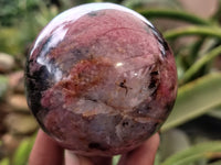 Polished Rhodonite Sphere x 3 From Ambindavato, Madagascar