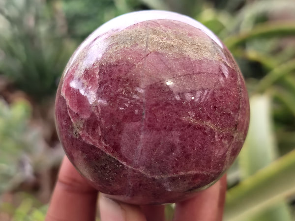 Polished Rhodonite Sphere x 3 From Ambindavato, Madagascar