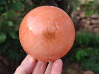 Polished Orange Twist Calcite Spheres x 2 From Maevantanana, Madagascar