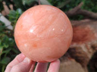 Polished Orange Twist Calcite Spheres x 2 From Maevantanana, Madagascar