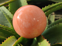 Polished Orange Twist Calcite Spheres x 2 From Maevantanana, Madagascar