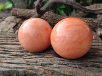 Polished Orange Twist Calcite Spheres x 2 From Maevantanana, Madagascar