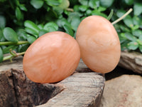 Polished Orange Twist Calcite Palm Stones x 20 From Madagascar