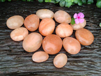 Polished Orange Twist Calcite Palm Stones x 20 From Madagascar