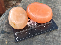 Polished Orange Twist Calcite Palm Stones x 20 From Madagascar