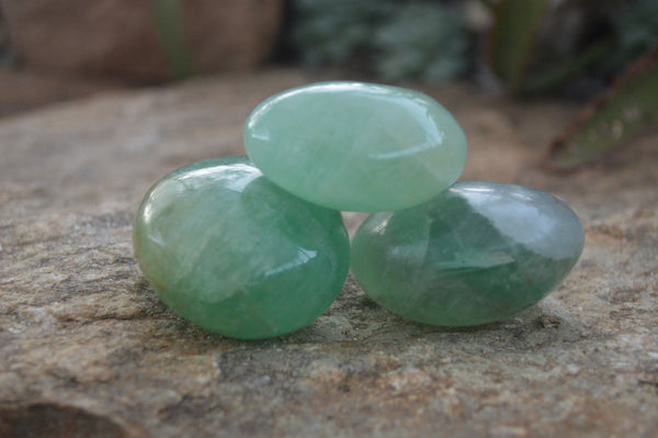 Polished Emerald Fluorite Palm Stones  x 12 From Mandrosonoro, Madagascar