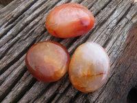 Polished Bright Red/ Orange Medium Sized Carnelian Palm Stones / Gallets - sold per kg - From Madagascar - TopRock