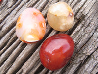 Polished Bright Red/ Orange Medium Sized Carnelian Palm Stones / Gallets - sold per kg - From Madagascar - TopRock