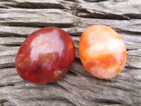 Polished Bright Red/ Orange Medium Sized Carnelian Palm Stones / Gallets - sold per kg - From Madagascar - TopRock