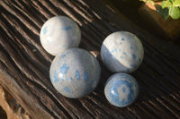 Polished Blue Spotted Spinel Quartz Spheres x 4 From Madagascar