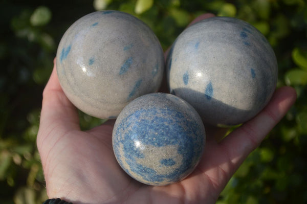 Polished Blue Spotted Spinel Quartz Spheres  x 4 From Madagascar