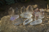 Polished Rare Inclusion Quartz Points x 12 From Madagascar