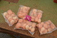 Polished Small Orange Twist Calcite Gallets / Palm Stones - sold per 1 kg - From Maevantanana, Madagascar - TopRock