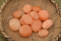 Polished Small Orange Twist Calcite Gallets / Palm Stones - sold per 1 kg - From Maevantanana, Madagascar - TopRock