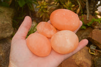 Polished Small Orange Twist Calcite Gallets / Palm Stones - sold per 1 kg - From Maevantanana, Madagascar - TopRock