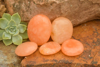 Polished Small Orange Twist Calcite Gallets / Palm Stones - sold per 1 kg - From Maevantanana, Madagascar - TopRock