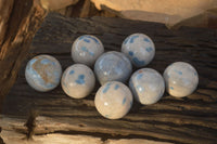 Polished Blue Spotted Spinel Quartz Spheres x 8 From Madagascar