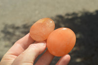 Polished Small Orange Twist Calcite Gallets / Palm Stones - sold per 1 kg - From Maevantanana, Madagascar - TopRock