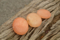 Polished Small Orange Twist Calcite Gallets / Palm Stones - sold per 1 kg - From Maevantanana, Madagascar - TopRock