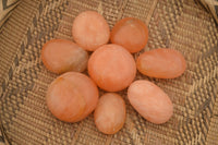 Polished Small Orange Twist Calcite Gallets / Palm Stones - sold per 1 kg - From Maevantanana, Madagascar - TopRock